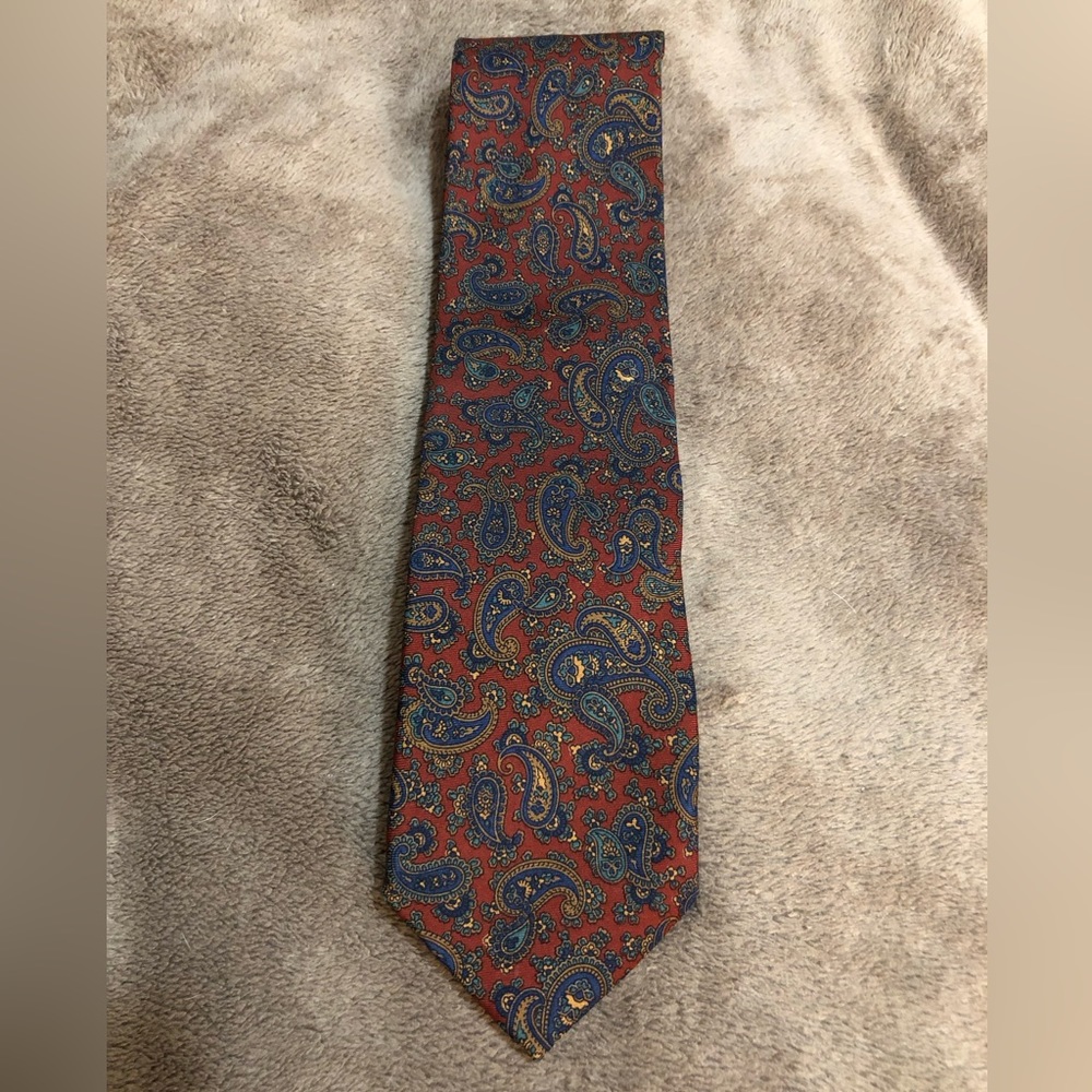 Red and blue paisley print tie by Nieman Marcus